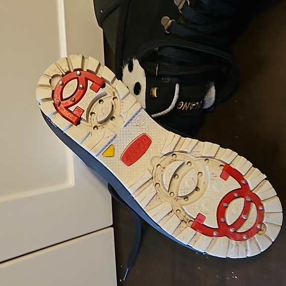 Olang ankle black boots with white trim and black polka dots. - Picture 5 of 5